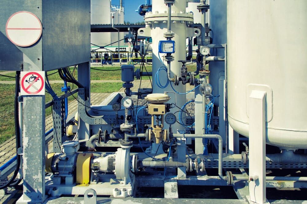 A Complex Network of Industrial Pipes, Valves, and Gauges Outdoors — Ray Smith Electrical in Korora, NSW