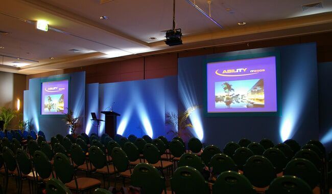 Conference Stage with Blue Backdrop — Rme in Sapphire, NSW