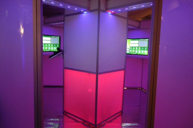 A Futuristic-Looking Room with A Lit Central Column and Screens — Rme in Sapphire, NSW