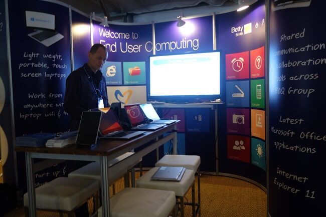 Man at A Microsoft Booth with Laptops — Rme in Sapphire, NSW