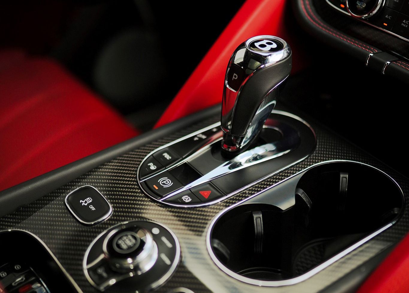 A Bentley car has a shifter with the letter B on it.