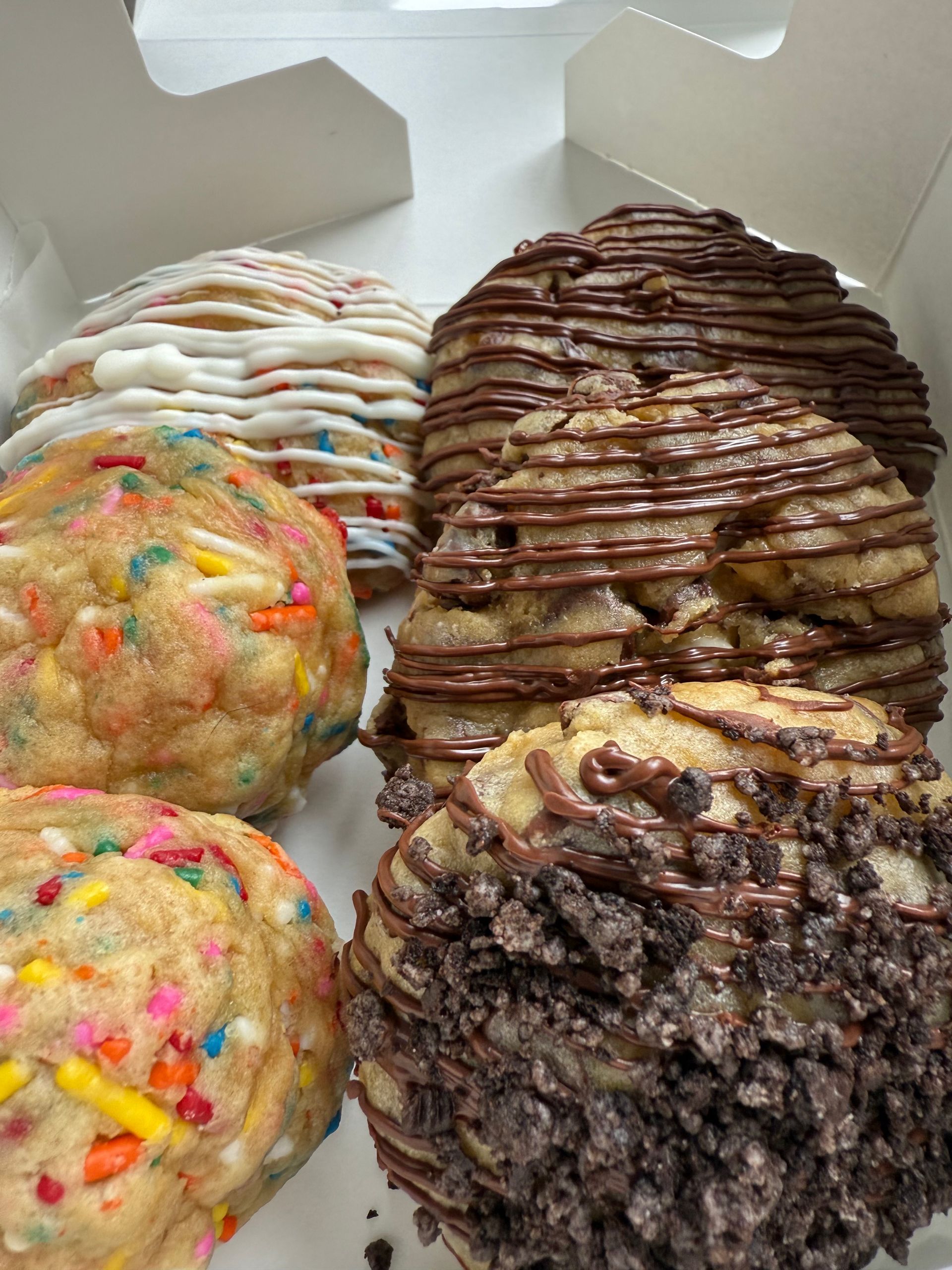 There are many different types of cookies in this box.