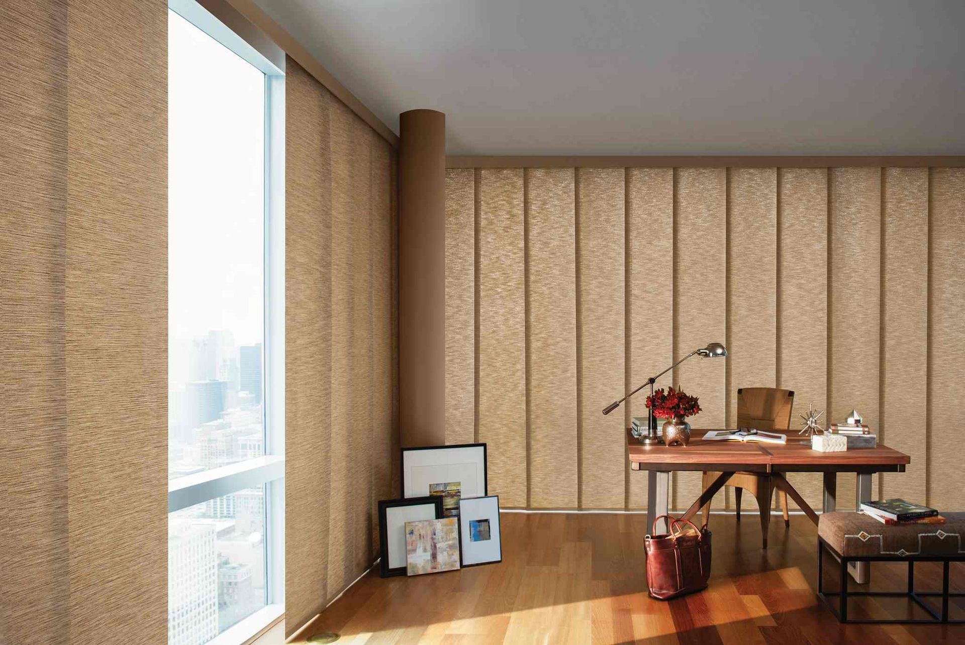 Hunter Douglas vertical shades covering floor to ceiling windows near Toledo, OH.