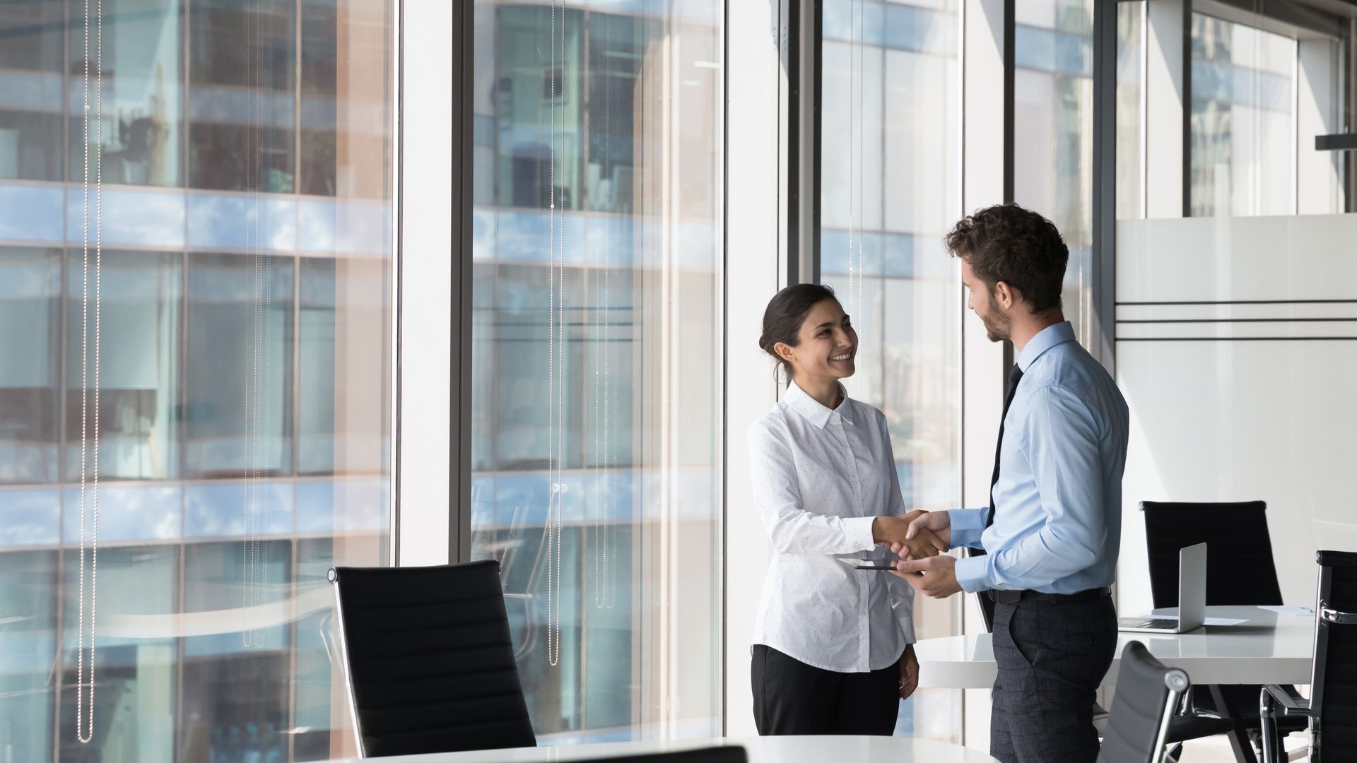 Shaking hands in office