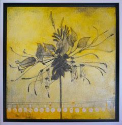 Black flower silhouette on a yellow and off-white abstract background, framed.