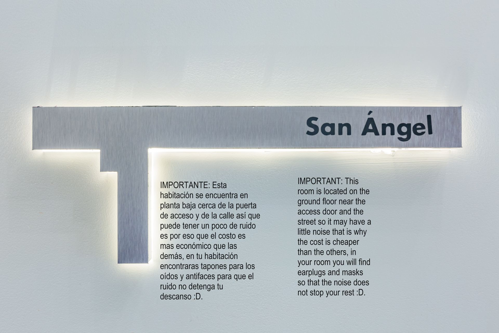 A sign on a wall that says san angel