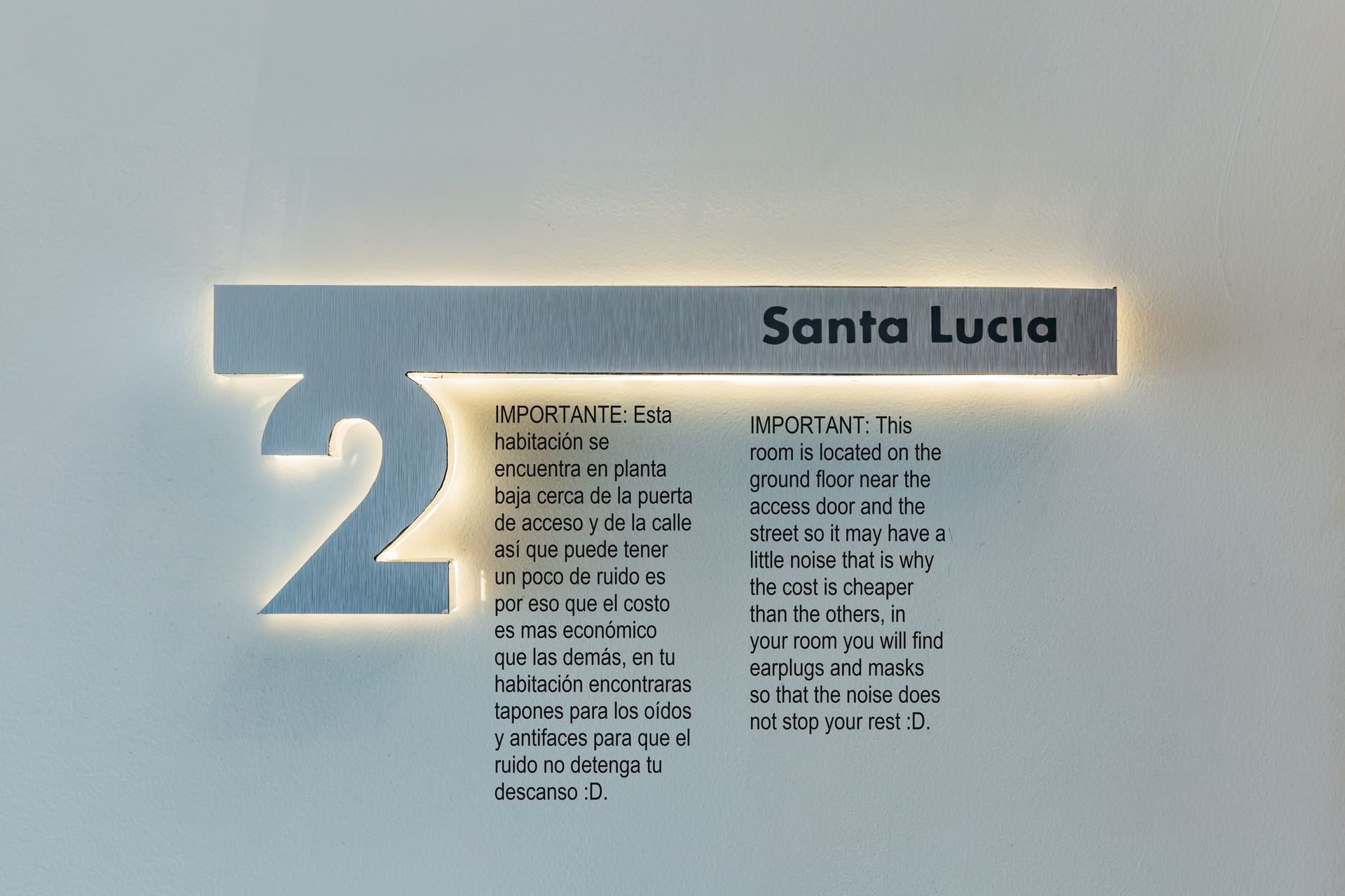 A sign on a wall that says santa lucia on it