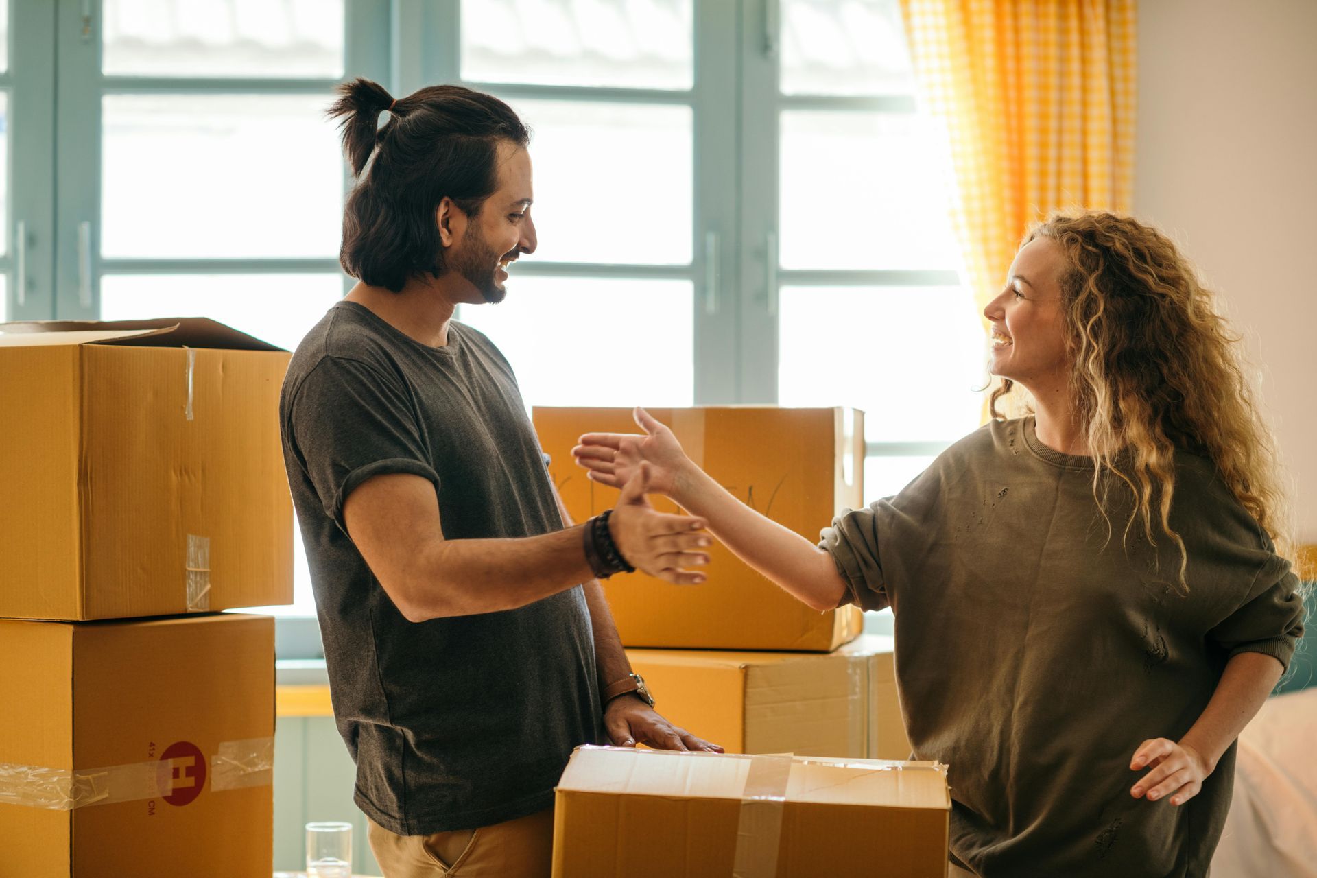 A man and a woman shaking hands