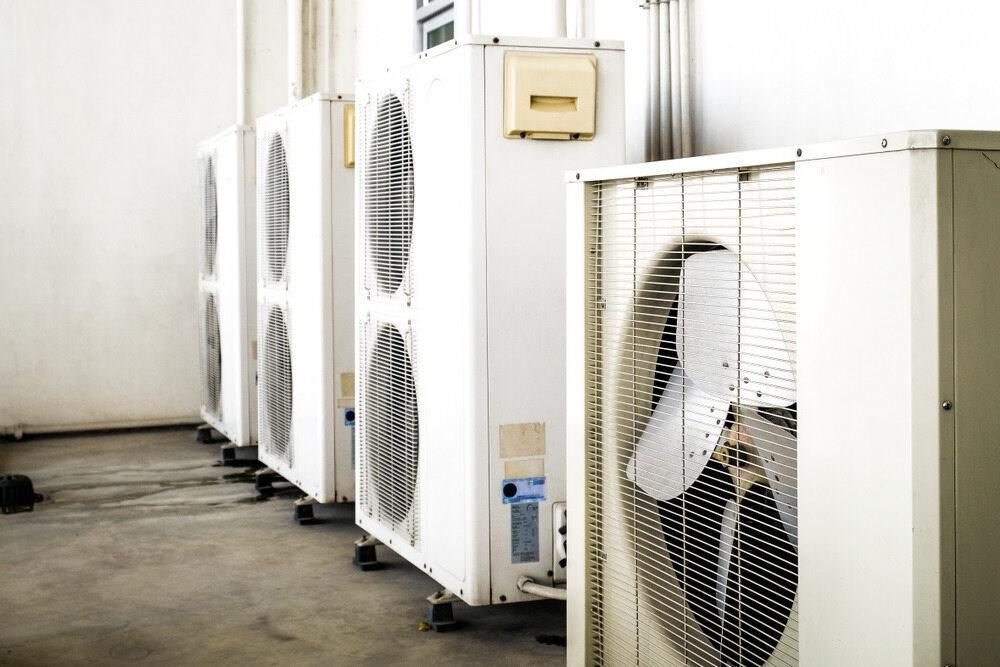 A Row of Air Conditioners Are Lined Up in a Room — AJM's Air Conditioning Centre in Coraki, NSW
