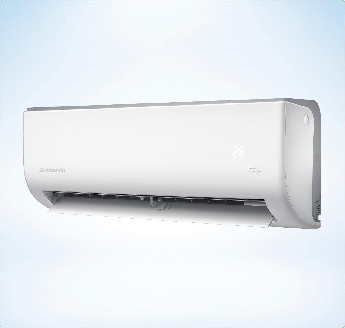 A White Air Conditioner is Hanging on a Wall on a Blue Background — AJM's Air Conditioning Centre in Lismore, NSW