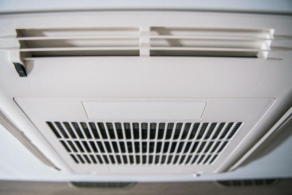A Close Up of a Ceiling Fan in a Room — AJM's Air Conditioning Centre in Alstonville, NSW