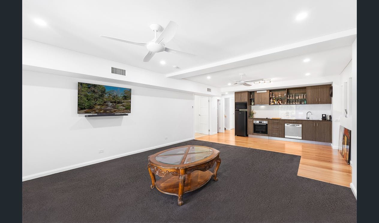 A Living Room With A split system air conditioning unit on the wall — AJM's Air Conditioning Centre in Lismore, NSW