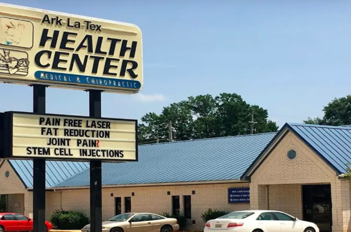 A sign for the ark la tex health center