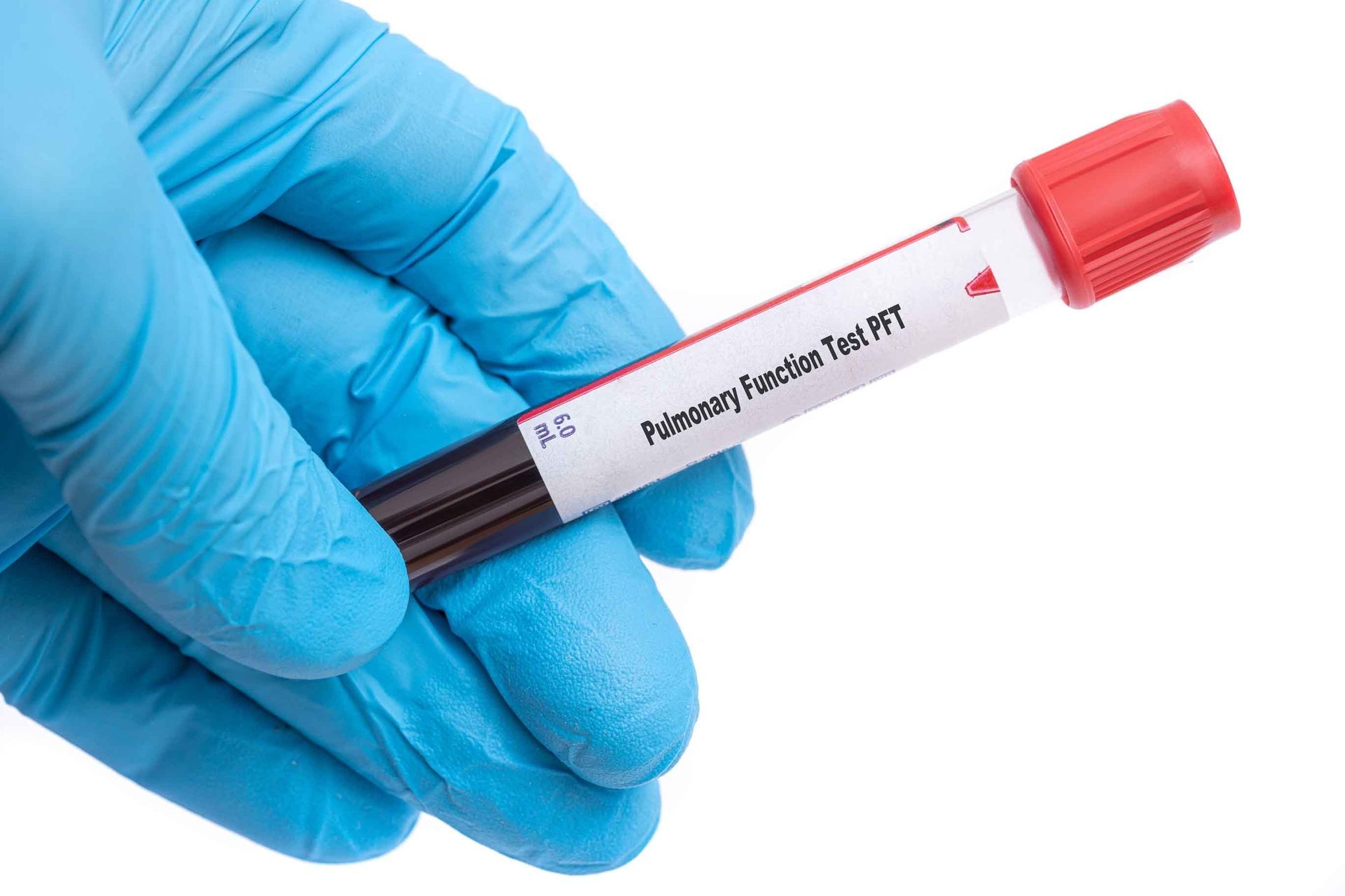 A Person holding testing sample