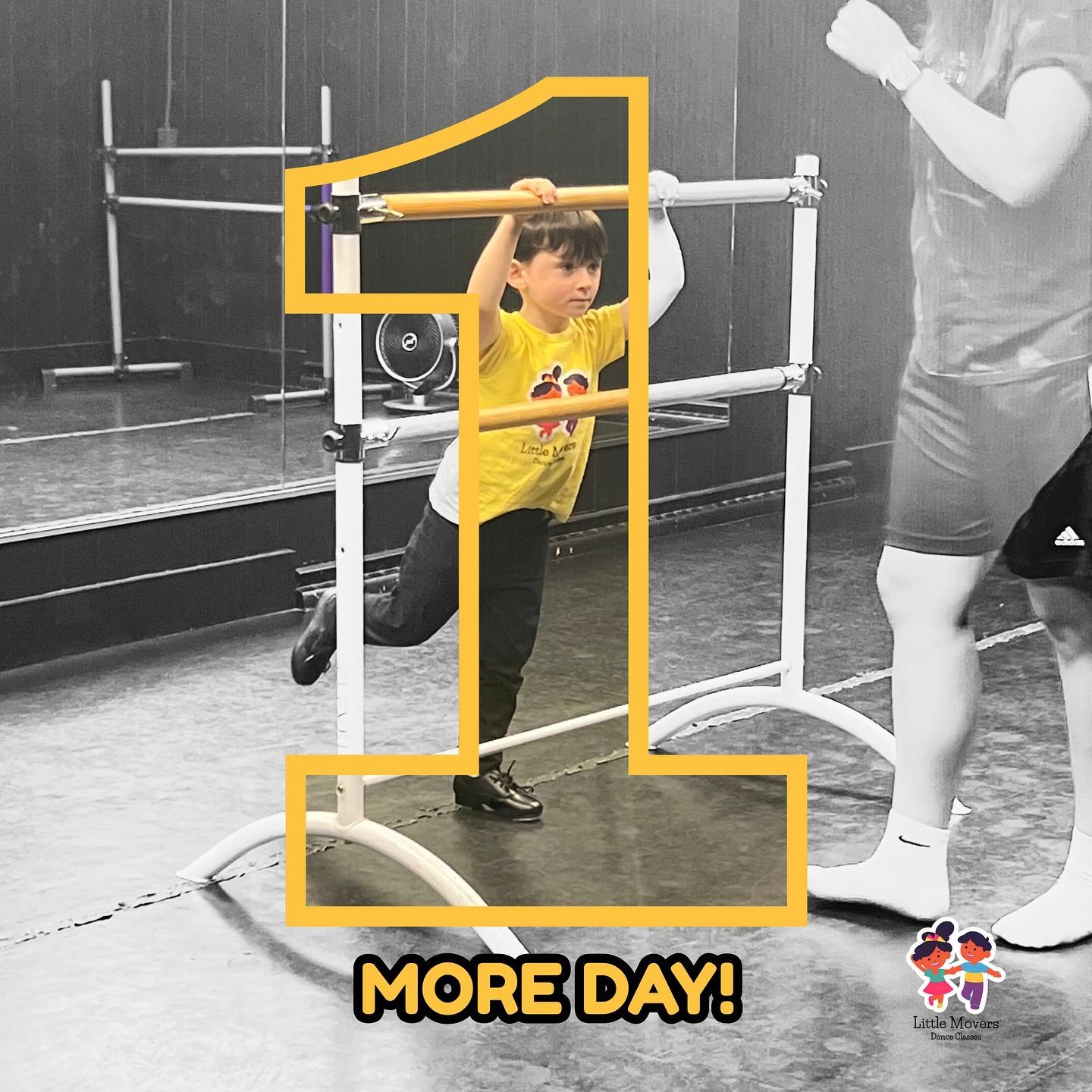Boy doing dance barre exercise, wearing a yellow shirt and black pants. 