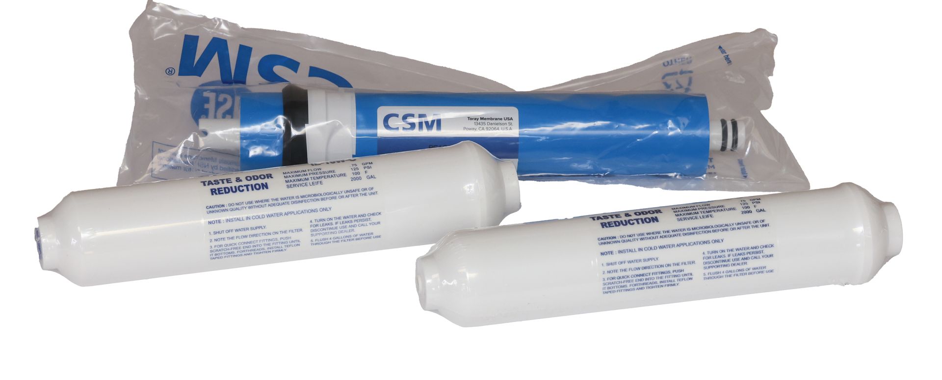 Three white tubes are sitting next to each other on a white surface.