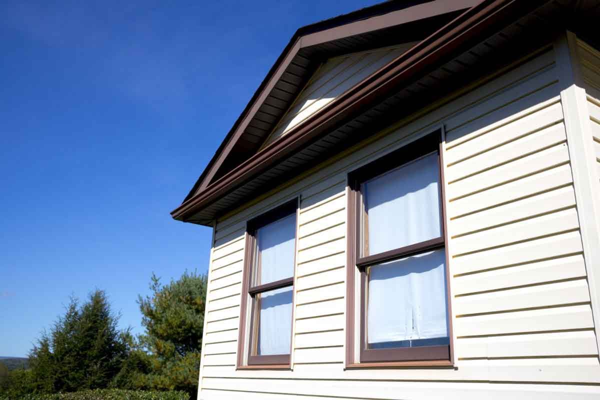 White Vinyl Siding — Dayton, OH — Bauer Roofing, Siding, Windows and Doors