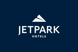 Jetpark Hotels logo on a dark blue background; white text and stylized airplane icon.