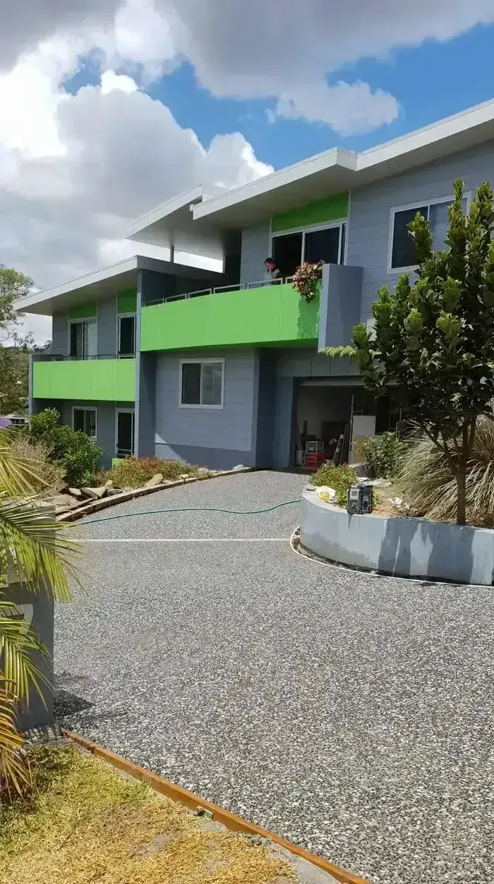 Two-story Building With Gray Walls, Green Accents — All Around Concreting in Wollongbar, NSW