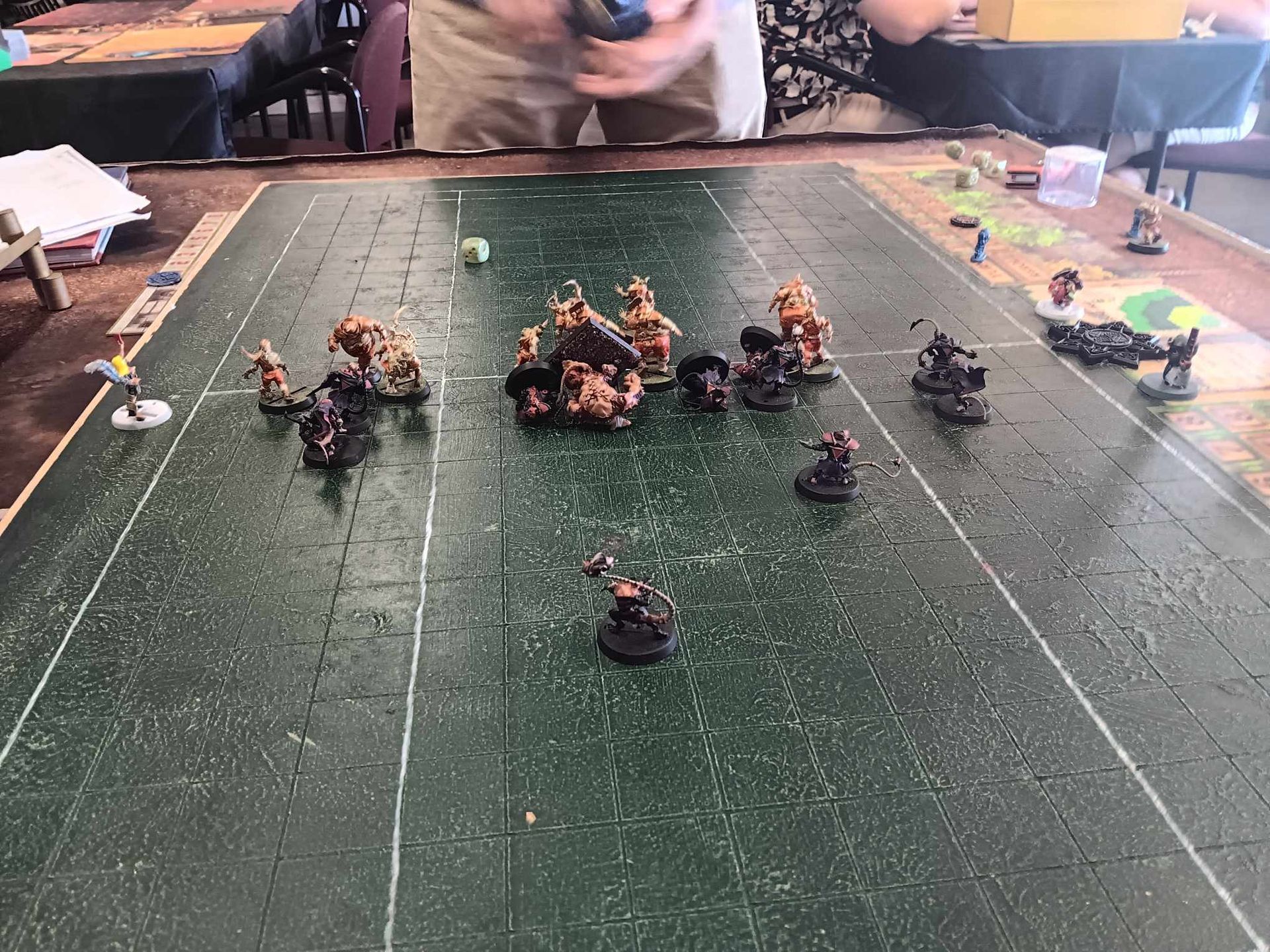 Miniature Tabletop Game With Figures on a Green Field — Grim Gaming & Hobbies in Bundaberg Central, QLD