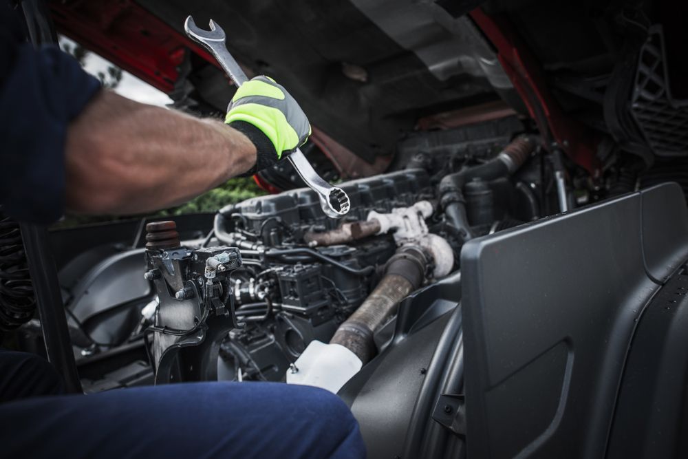 Mechanic Using a Wrench to Work on A Engine — Bundaberg Field Service in Agnes Waters, QLD