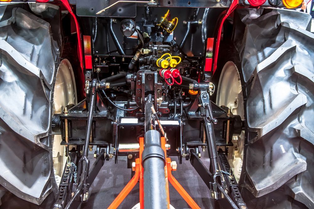 Interior View of A Red Tractor Cab — Bundaberg Field Service in Bargara, QLD