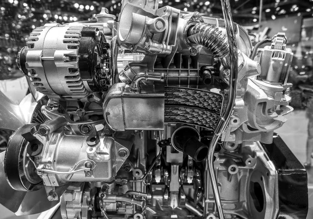 Close-up of a complex metal engine with pipes, gears, and polished components in a workshop. — Bundaberg Field Service in Woodgate, QLD