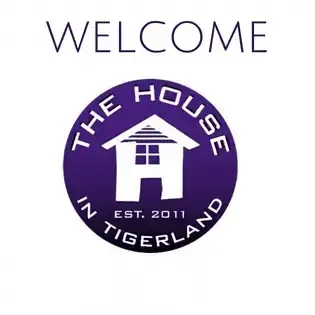 A welcome sign for the house in tigerland