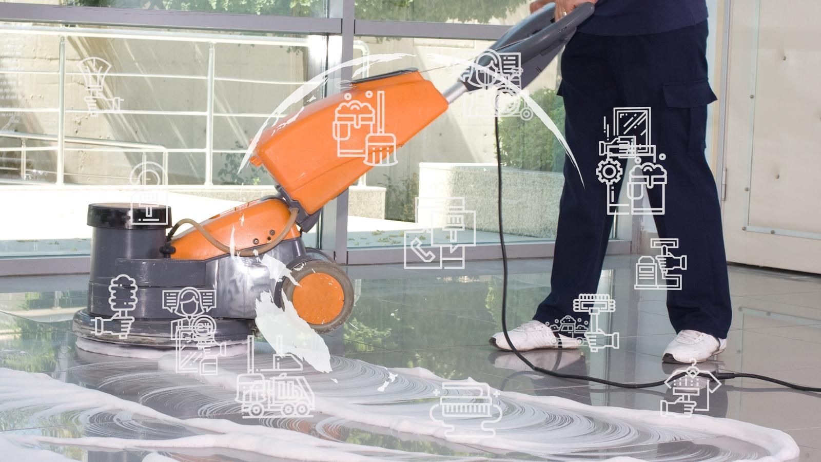 Industrial cleaning equipment being used on a commercial floor in a facility