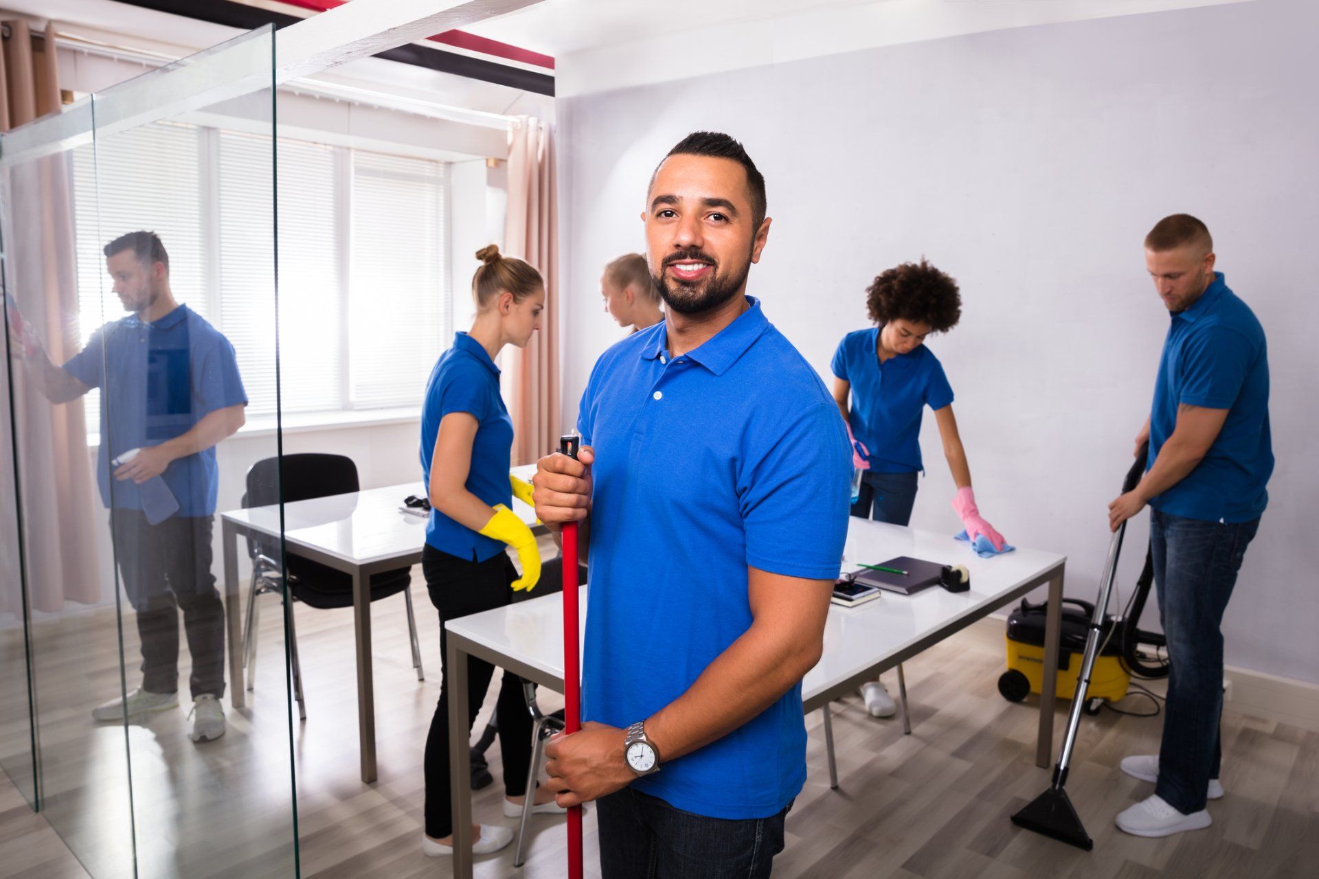An experienced cleaner enjoying his work