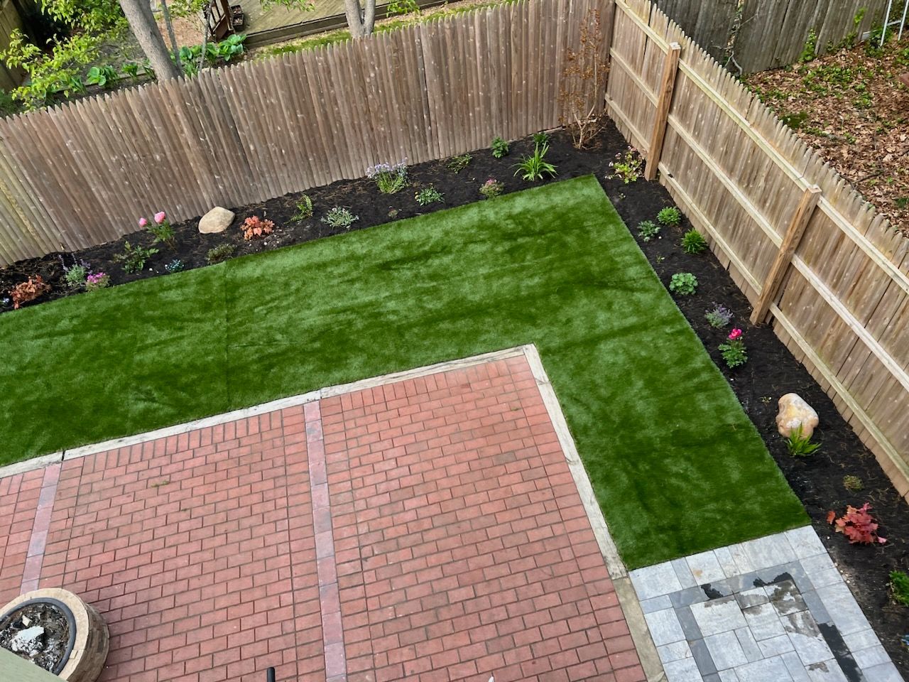 synthetic grass installation project in backyard