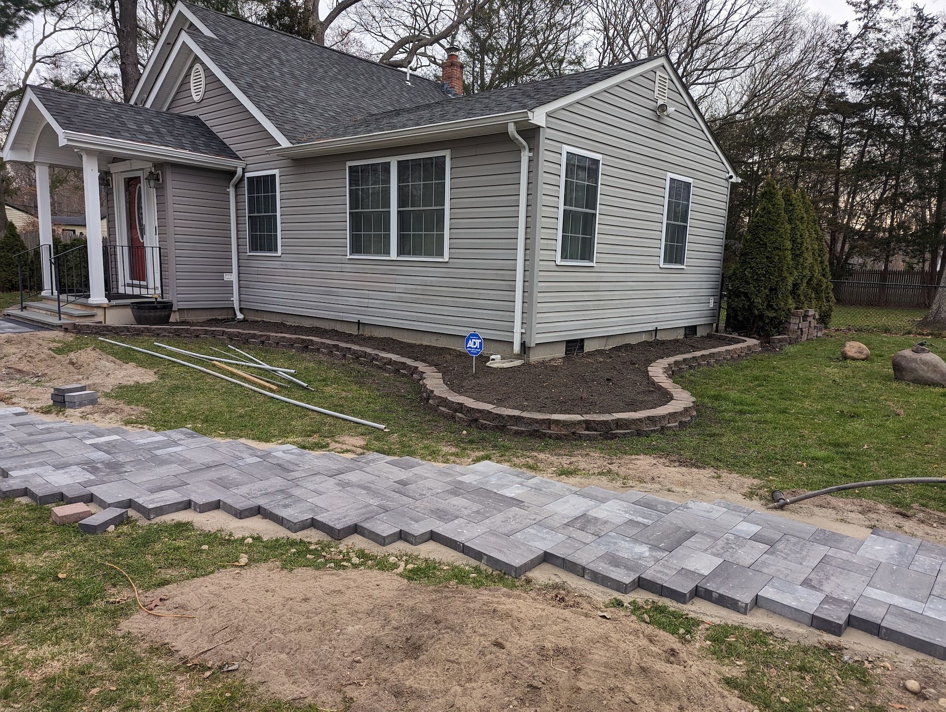 new paver walkway installation in progress