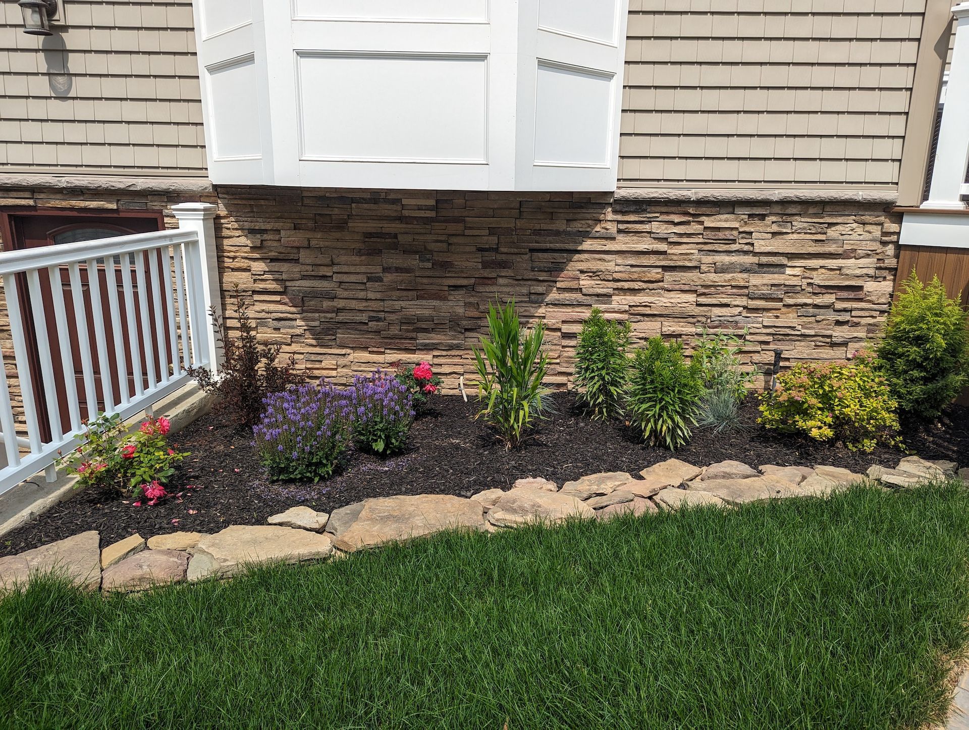 residential landscape design & installation with new flowers & bushes