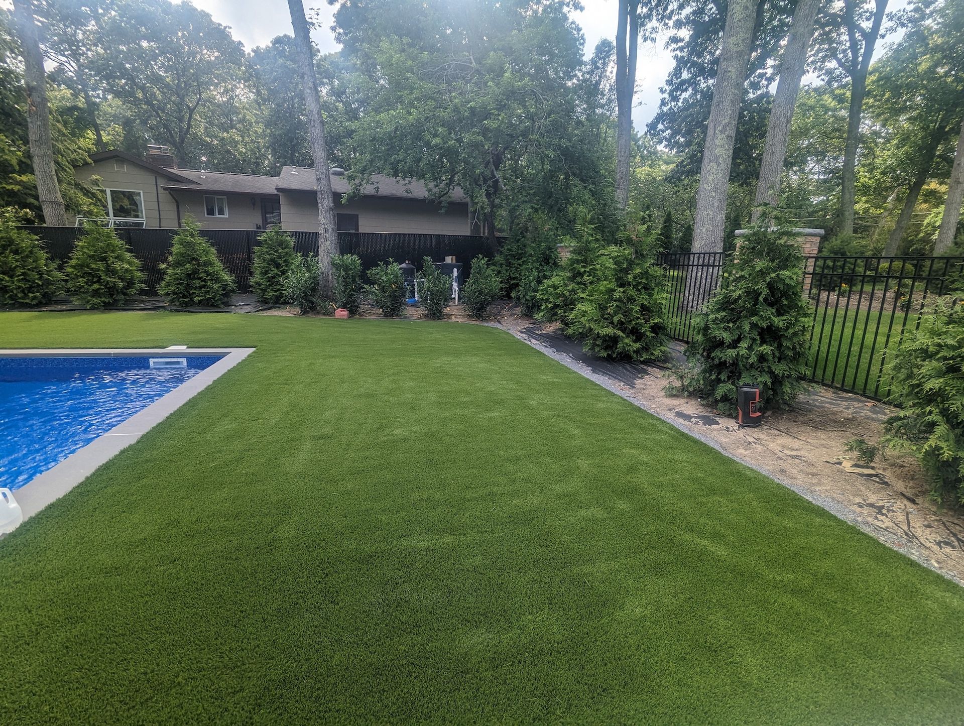 artificial turf install around pool