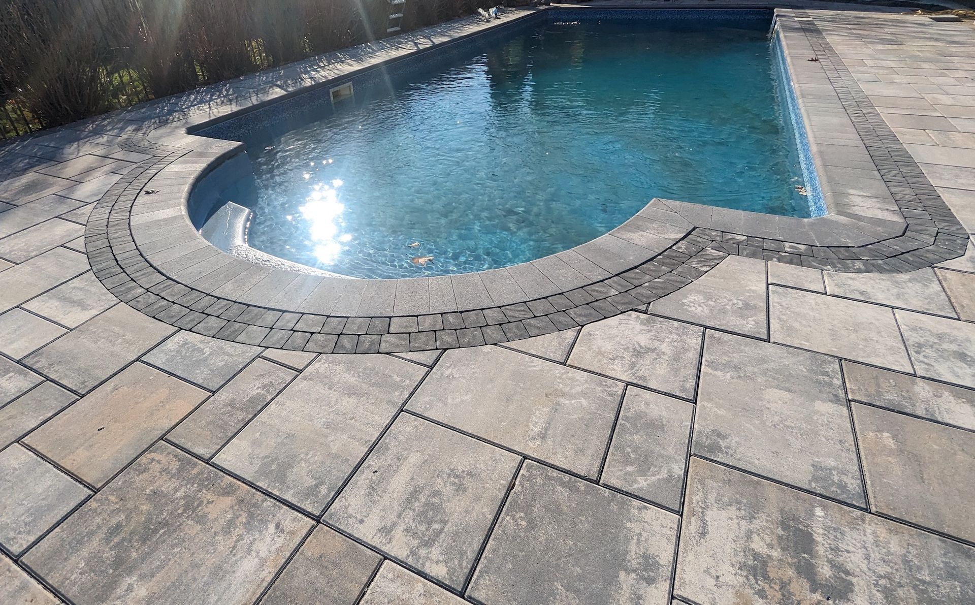 accent tile installation around residential pool