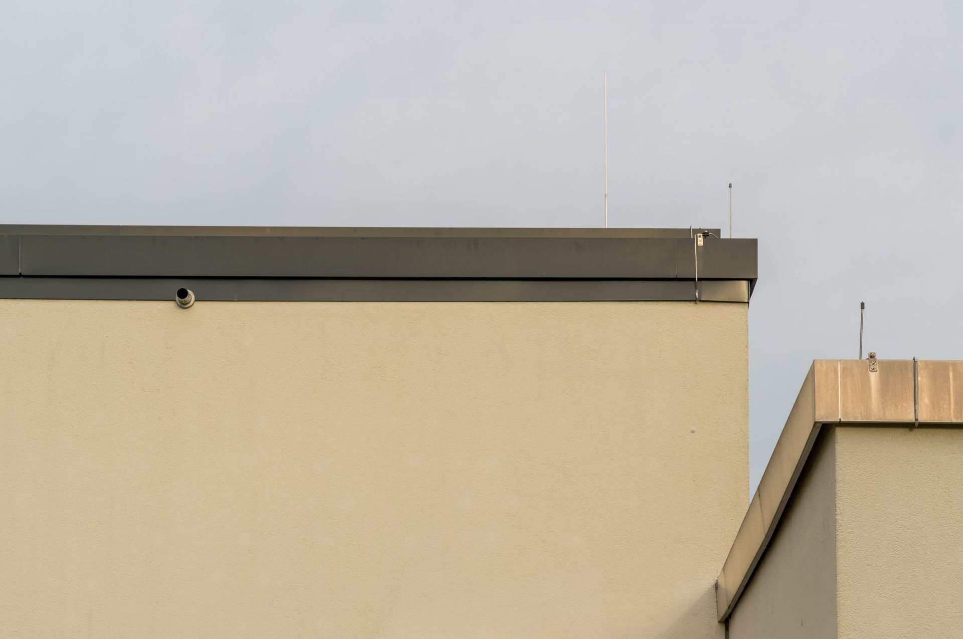The roof of a building with a camera on it.