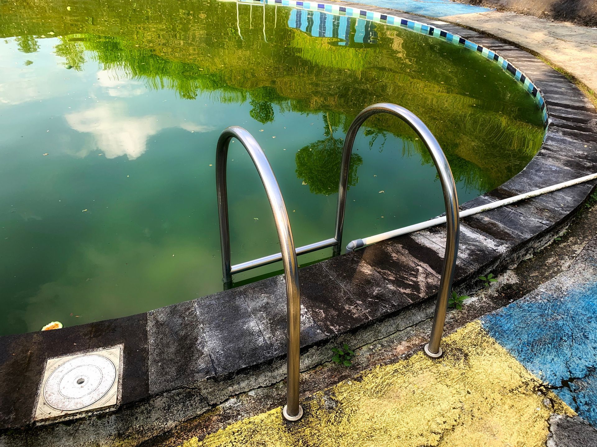 An abandoned, decaying pool.