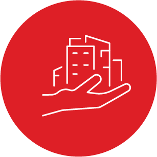 A hand is holding a building in a red circle.