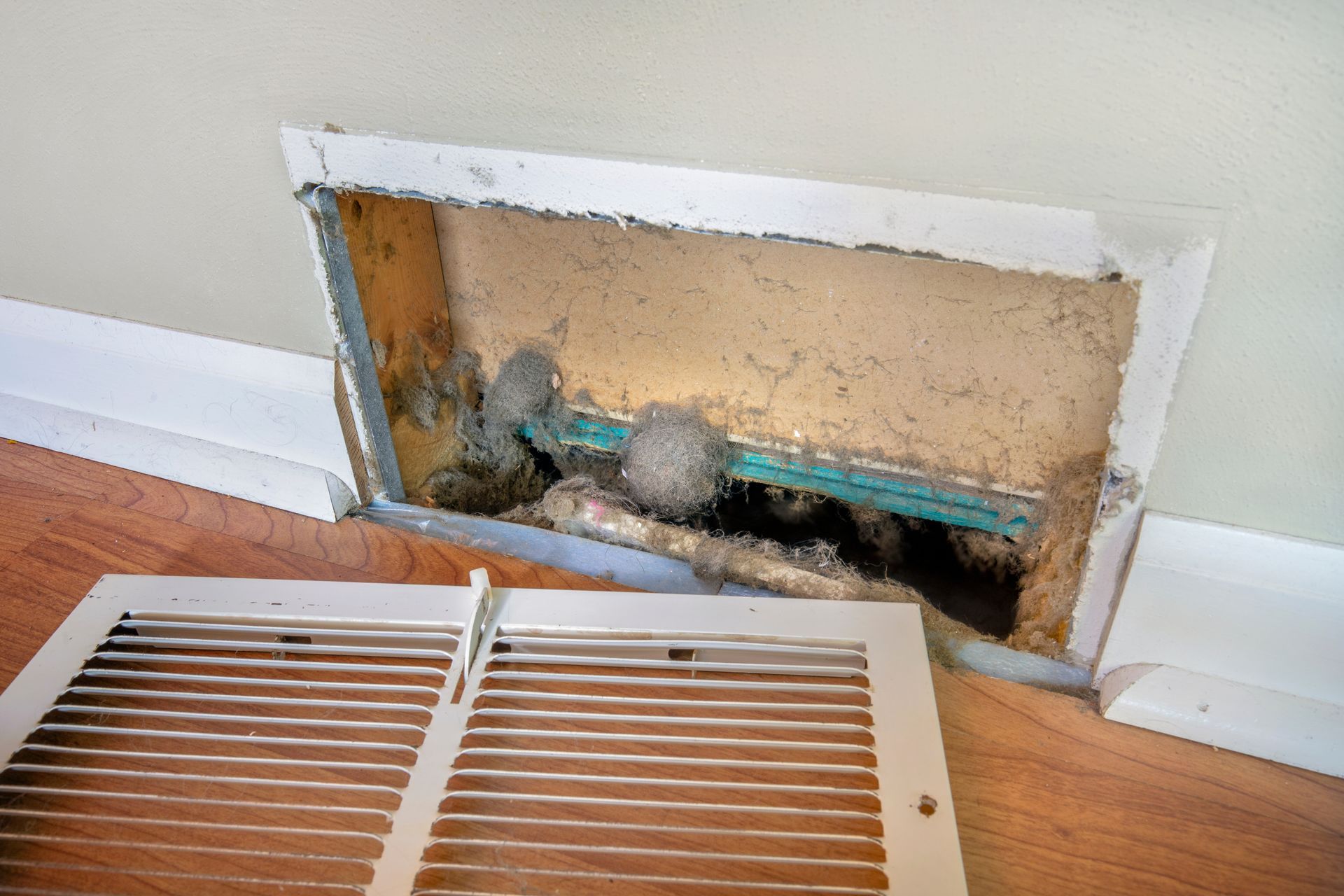Photograph of a wall air vent with the cover removed Photograph of a wall air vent with the cover removed