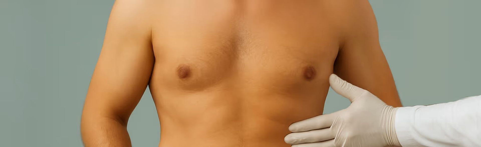 Bare-chested torso being examined by a gloved hand against a plain background