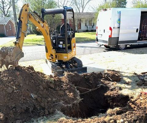 A yellow excavator is digging a hole in the ground next to a white van. A yellow excavator is digging a hole in the ground next to a white van.