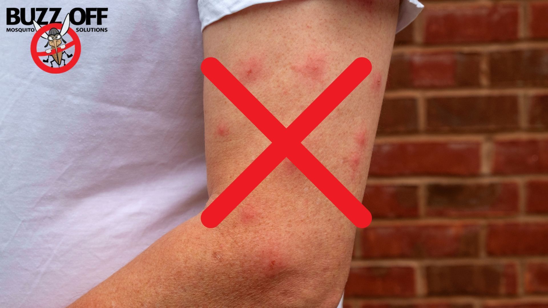 A person 's arm with a red cross and a buzz off logo in the background
