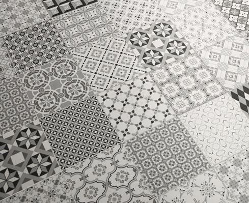 rivestimento in ceramica con mattonelle tutte diverse bianche e nere