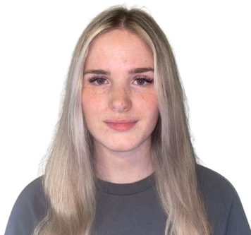 Blonde woman with long hair and a neutral expression, wearing a gray shirt, against a white background.