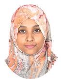 Woman with brown skin wearing a patterned headscarf, smiling slightly.