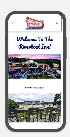 A cell phone displaying a website for the riverboat inn Madison Indiana