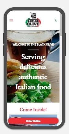 A cell phone displaying a website for the riverboat inn Madison Indiana
