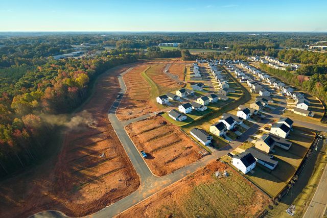 aerial-view-of-construction-site-with-new-tightly-2026-03-25-09-46-03-utc