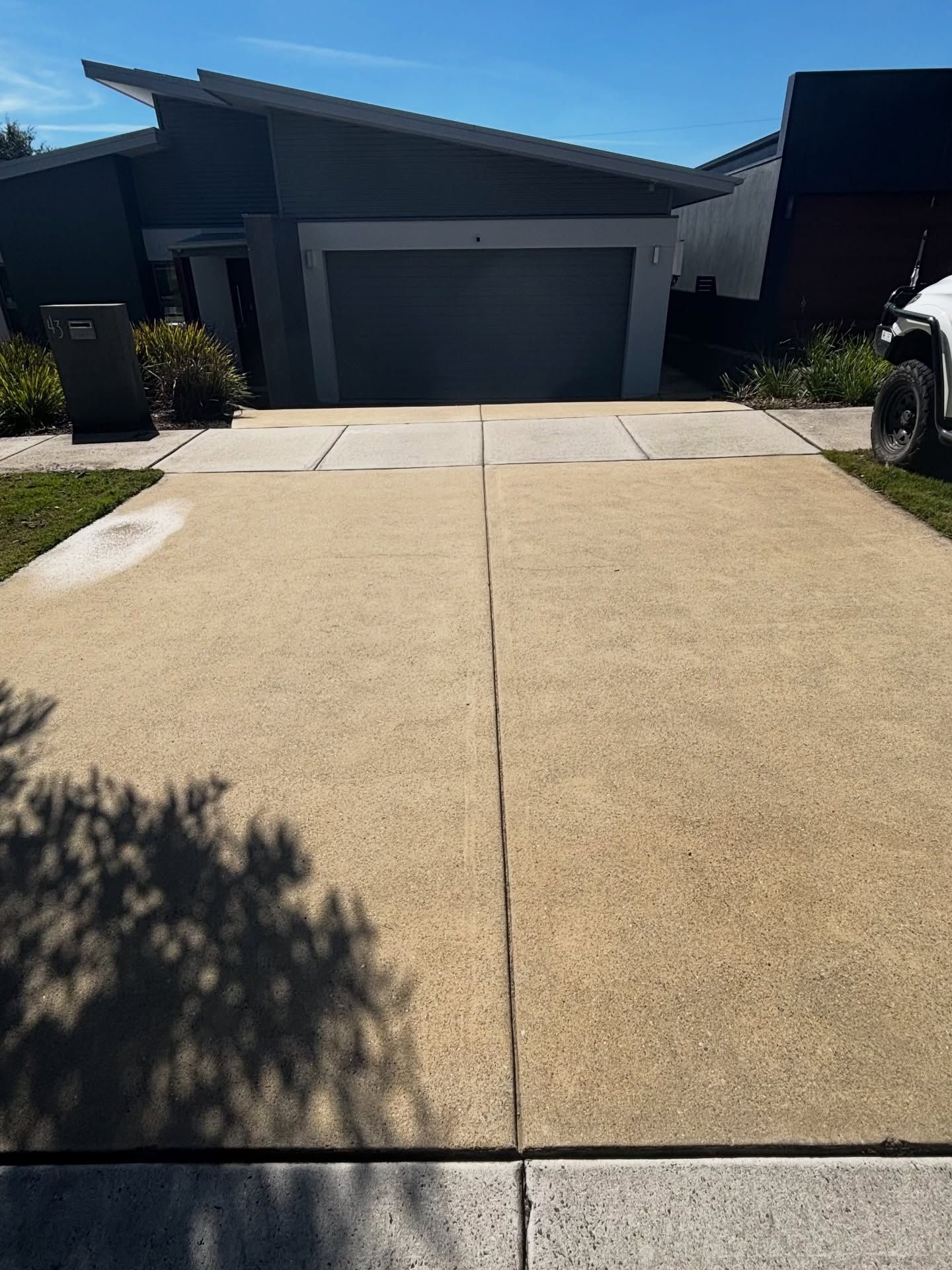 Clean Concrete Driveway — Pressure Perfect Cleaning Solutions in Symonston, ACT