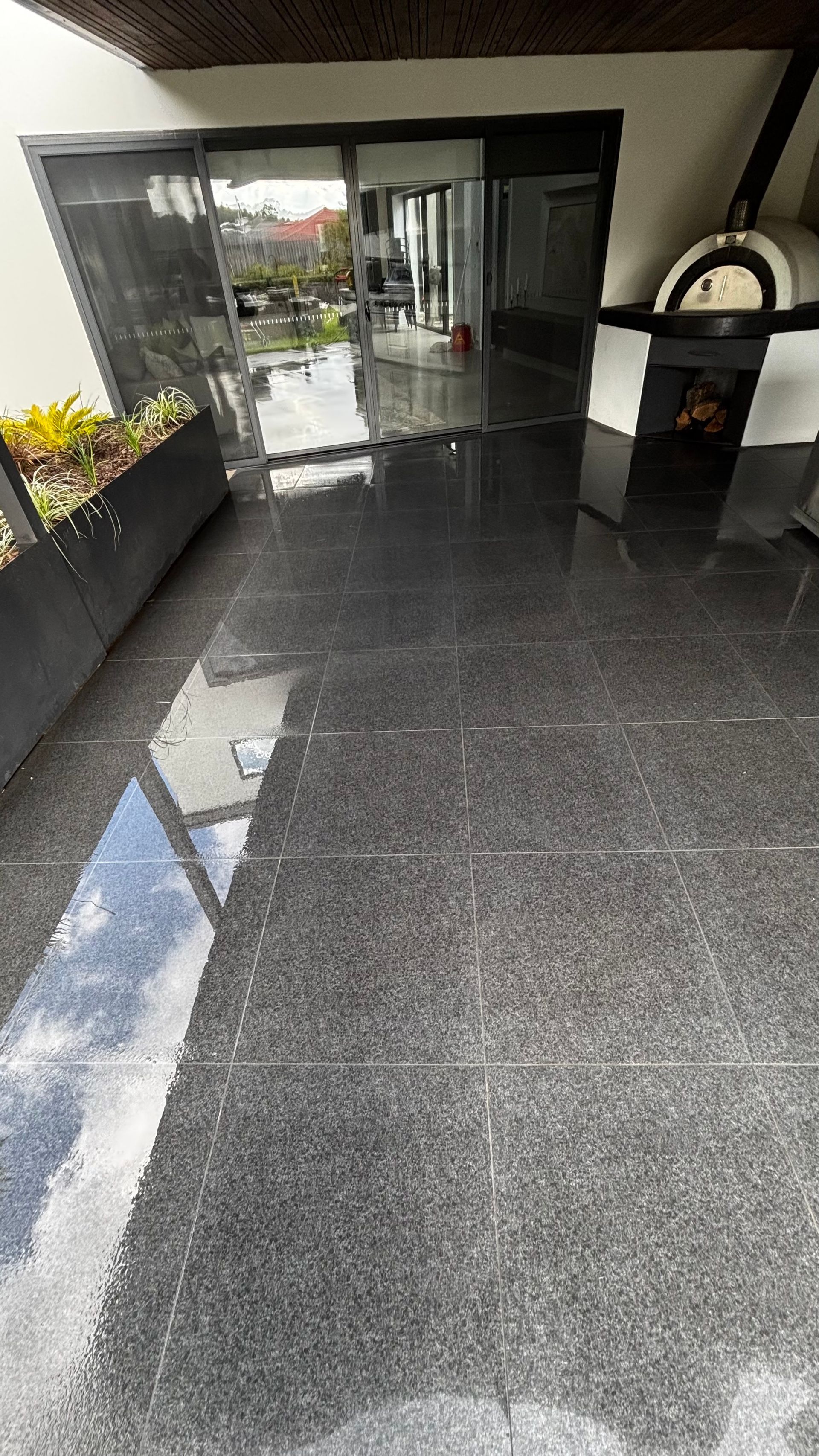 Stone Patio With a Large Planter Box — Pressure Perfect Cleaning Solutions in Symonston, ACT